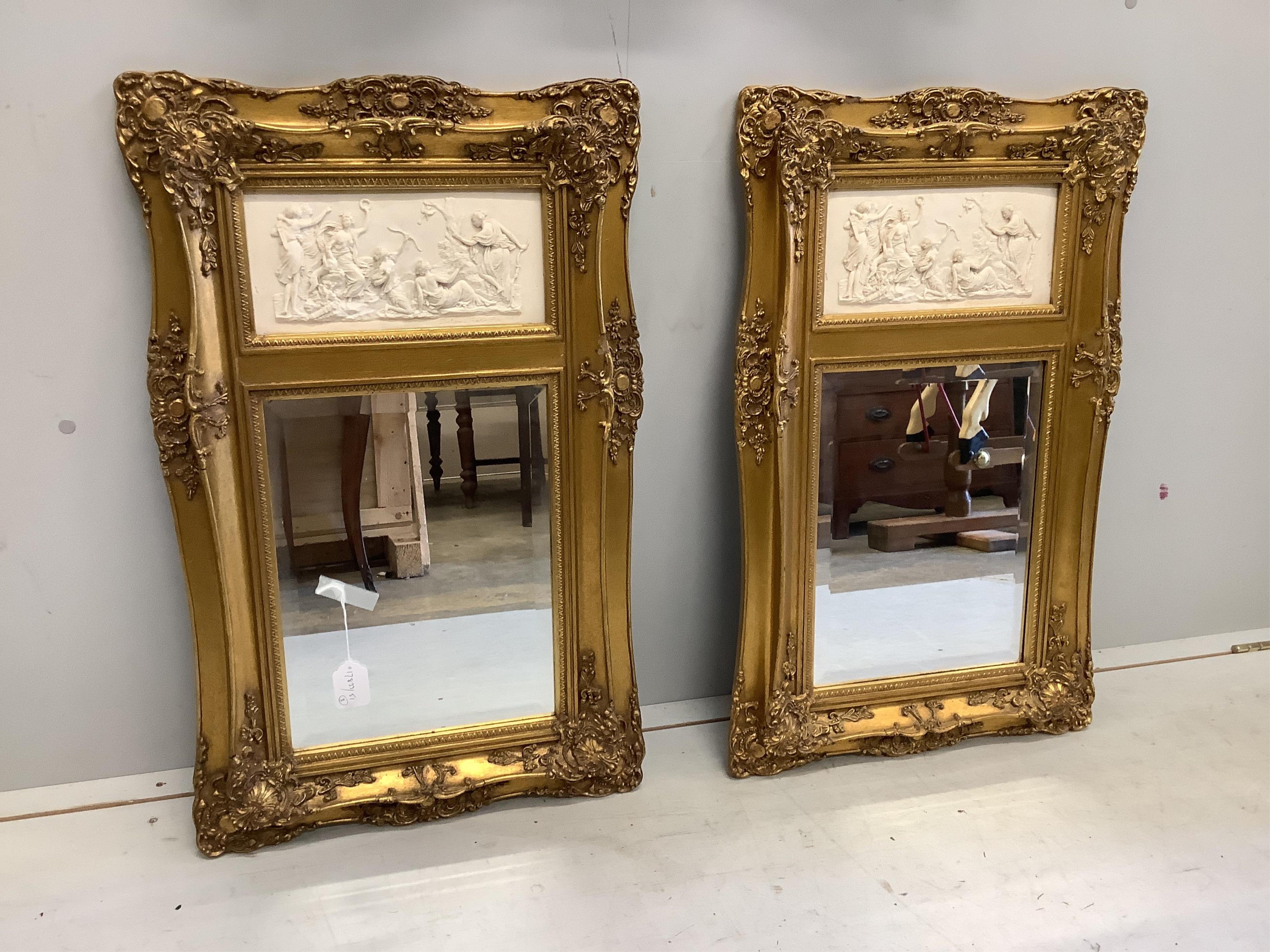 A pair of Victorian style gilt composition and faux marble wall mirrors, width 51cm, height 82cm, together with a similar larger mirror, width 77cm, height 87cm